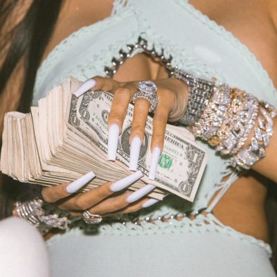 Money in celebrities hands at Booby Trap On the River